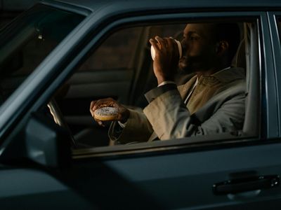 Man driving a car focusing on posture comfort